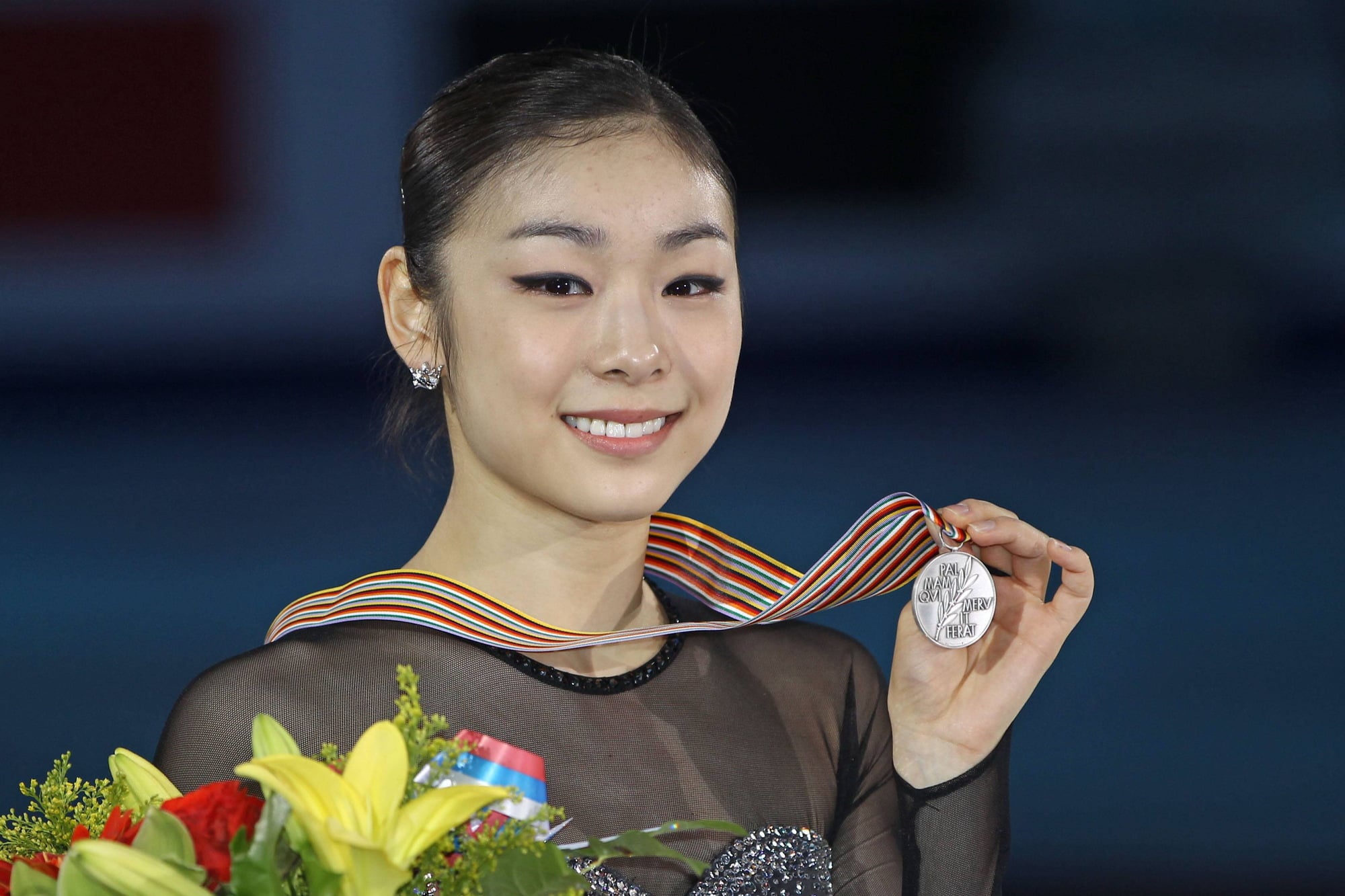Ю-На Ким с серебряной медалью чемпионата мира 2011 года.